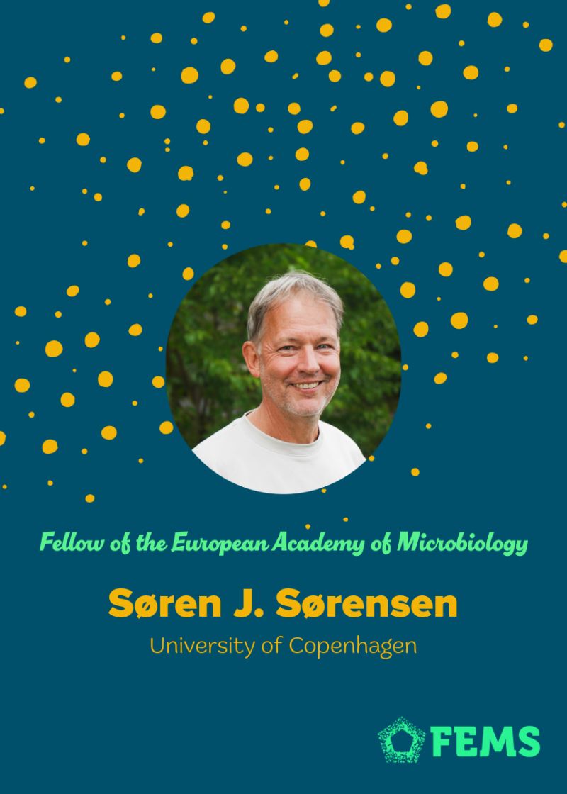 A portrait of Søren J. Sørensen against a dark blue background with yellow dots, identifying him as a Fellow of the European Academy of Microbiology.